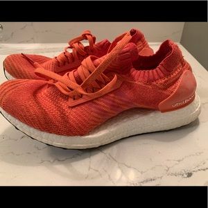 Adidas UltraBoost X orange women’s sneaker.